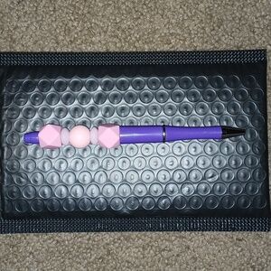 One of a kind custom beadable pens.